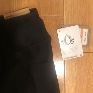 Reebok black Capri with side pockets